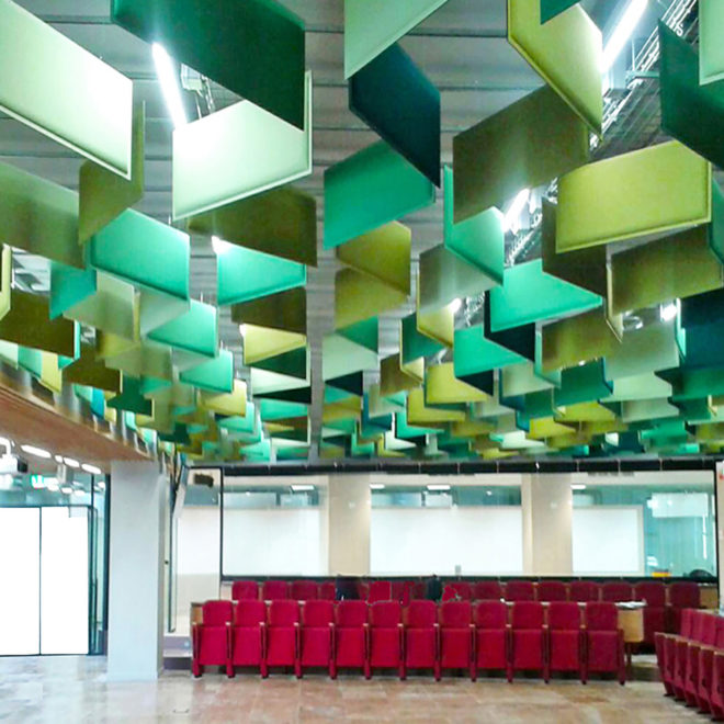 Customized acoustic green panels suspended on the ceiling