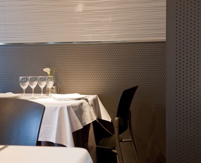 Wood acoustic wall  covering in a restaurant