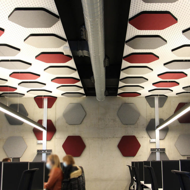 Soundproofing red and grey panels in a call center