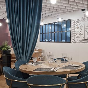 White sound absorbing ceiling baffles in a restaurant