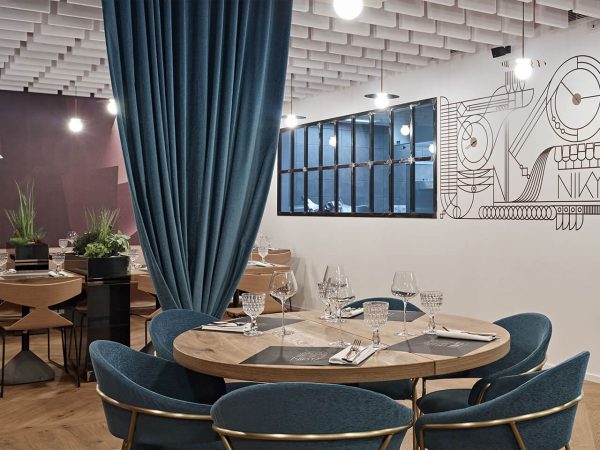 White sound absorbing ceiling baffles in a restaurant