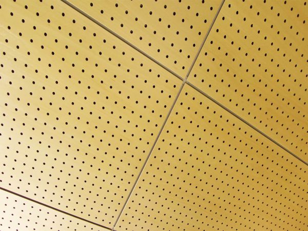 Perforated wood panels for workspaces false ceiling