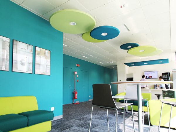 Sound absorbing panel with led lamps in a company coffee room