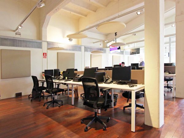 White sound absorbing ceiling panels in a call center