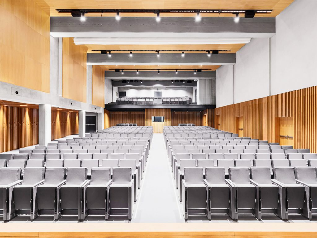Wooden sound proofing wall and ceiling panels in auditorium