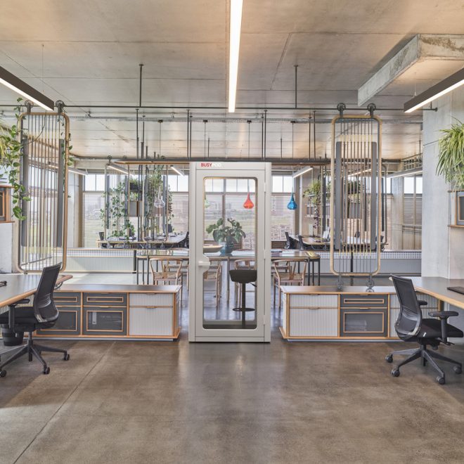 Individual white phone booth in openspace office