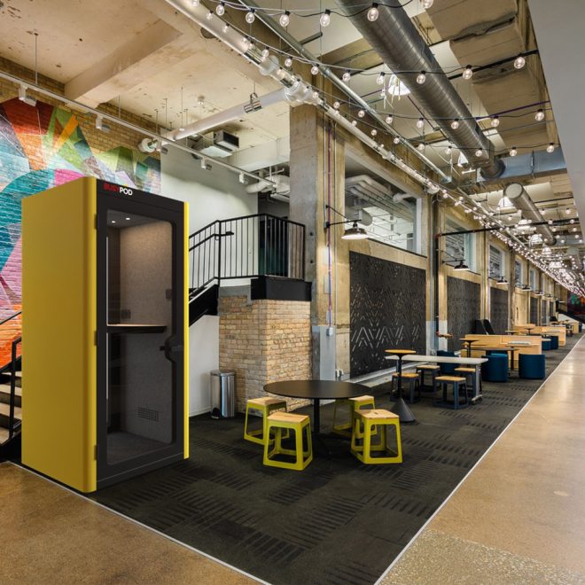 Yellow phone booth for videocalls in public spaces