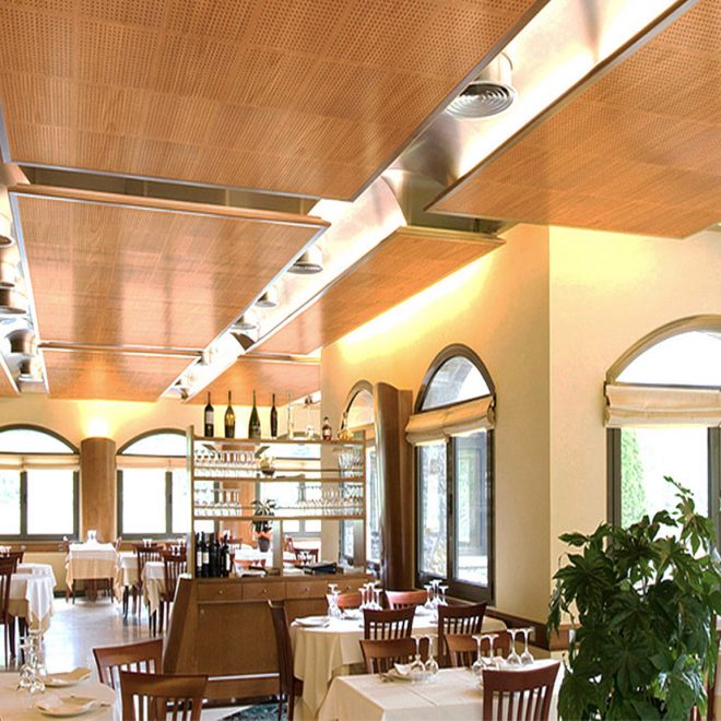 Sound absorbing wooden panels on the ceiling of a restaurant