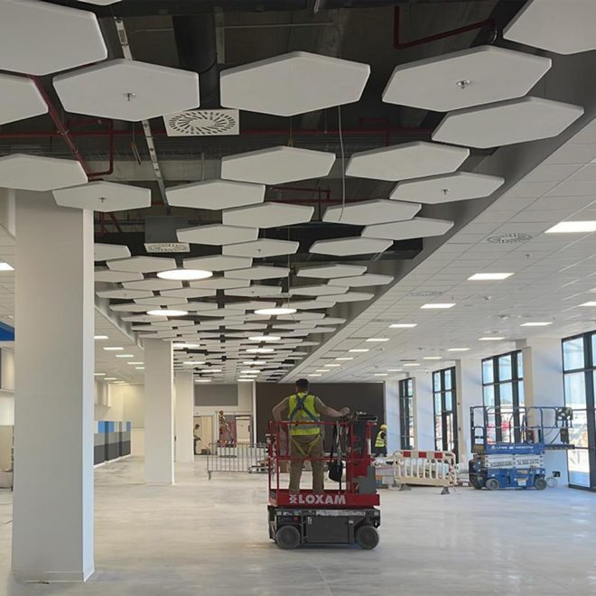 Logistics base and sound absorbing hexagonal white panels