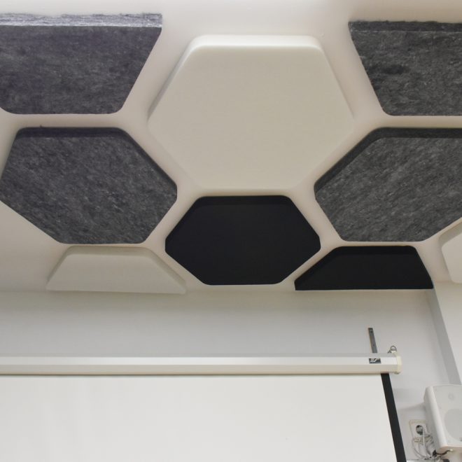 Sound absorbing false ceiling with polyester fiber panels