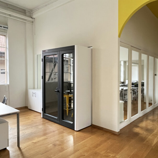 The phone booths in work spaces for two people white walls