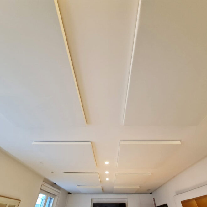Acoustic ceiling panels acoustic correction in work spaces